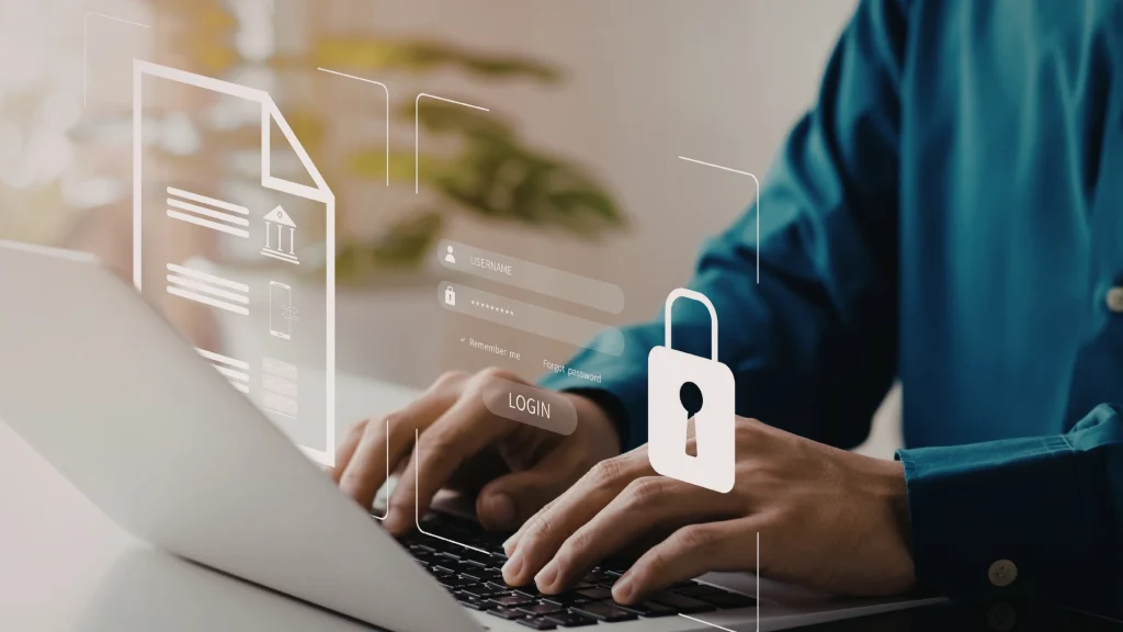 Person typing on laptop with login interface and lock icon