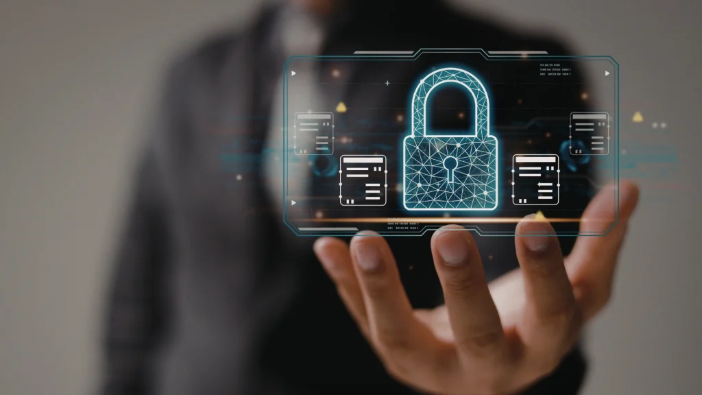 Hand showing a digital interface with padlock Cybersecurity symbol