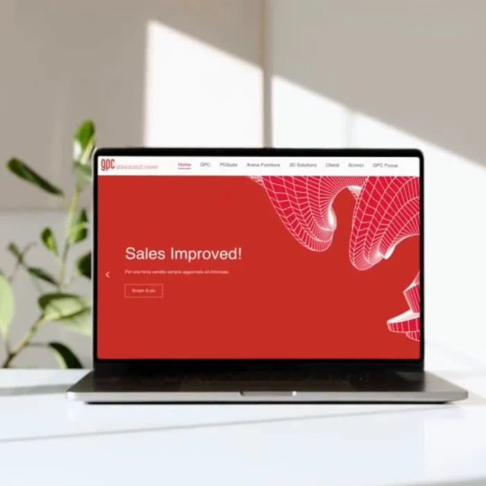 Homepage del sito GPC visualizzata su laptop con sfondo rosso e grafiche 3D.