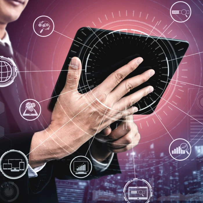 Man in suit using a tablet with digital icons and SEO symbols overlay for how to measure SEO effectiveness